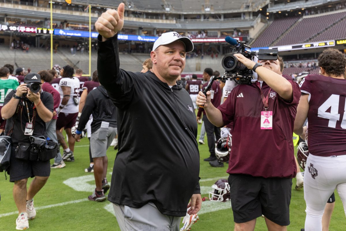 Head+Coach+Mike+Elko+gives+a+thumbs+up+to+the+fans+during+Texas+A%26amp%3BMs+Spring+Game+on+Saturday%2C+April+20%2C+2024%2C+at+Kyle+Field.+%28CJ+Smith%2FThe+Battalion%29