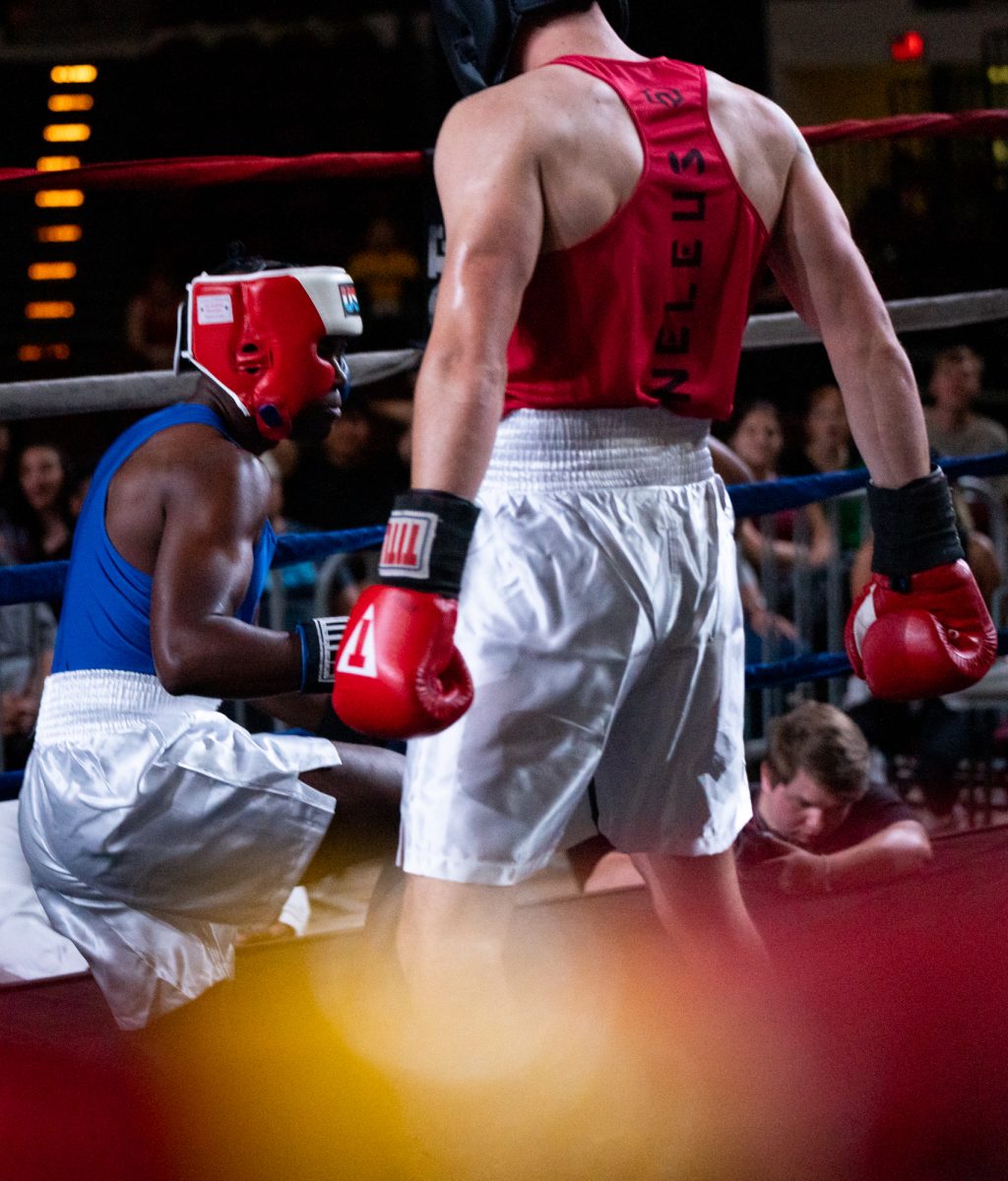 Light Heavyweight fighter Jake Young knocks down opponent Glenn Peacock during Farmers Fight Night on Thursday, April 4th, 2024, at Reed Arena.