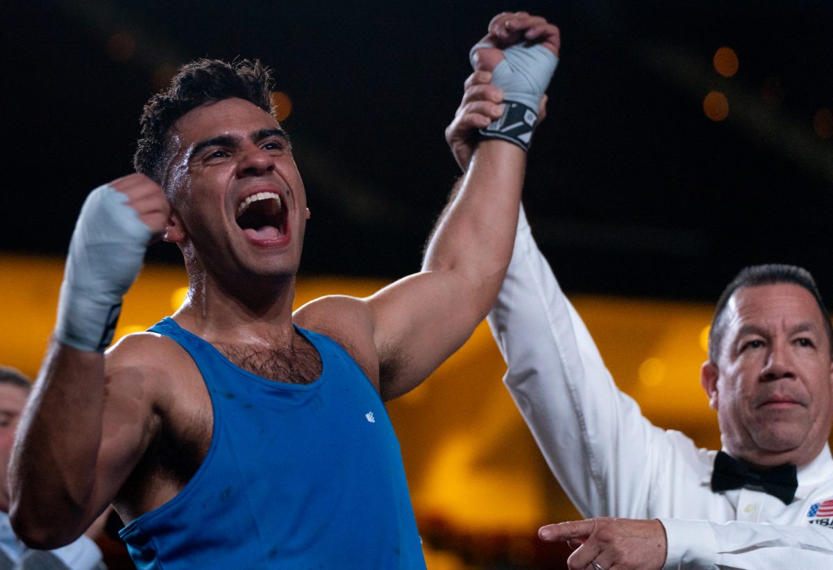 Light Heavyweight fighter Emiliano Sanchez celebrates his victory over opponent AJ Baird during Farmers Fight Night on Thursday, April 4th, 2024, at Reed Arena.