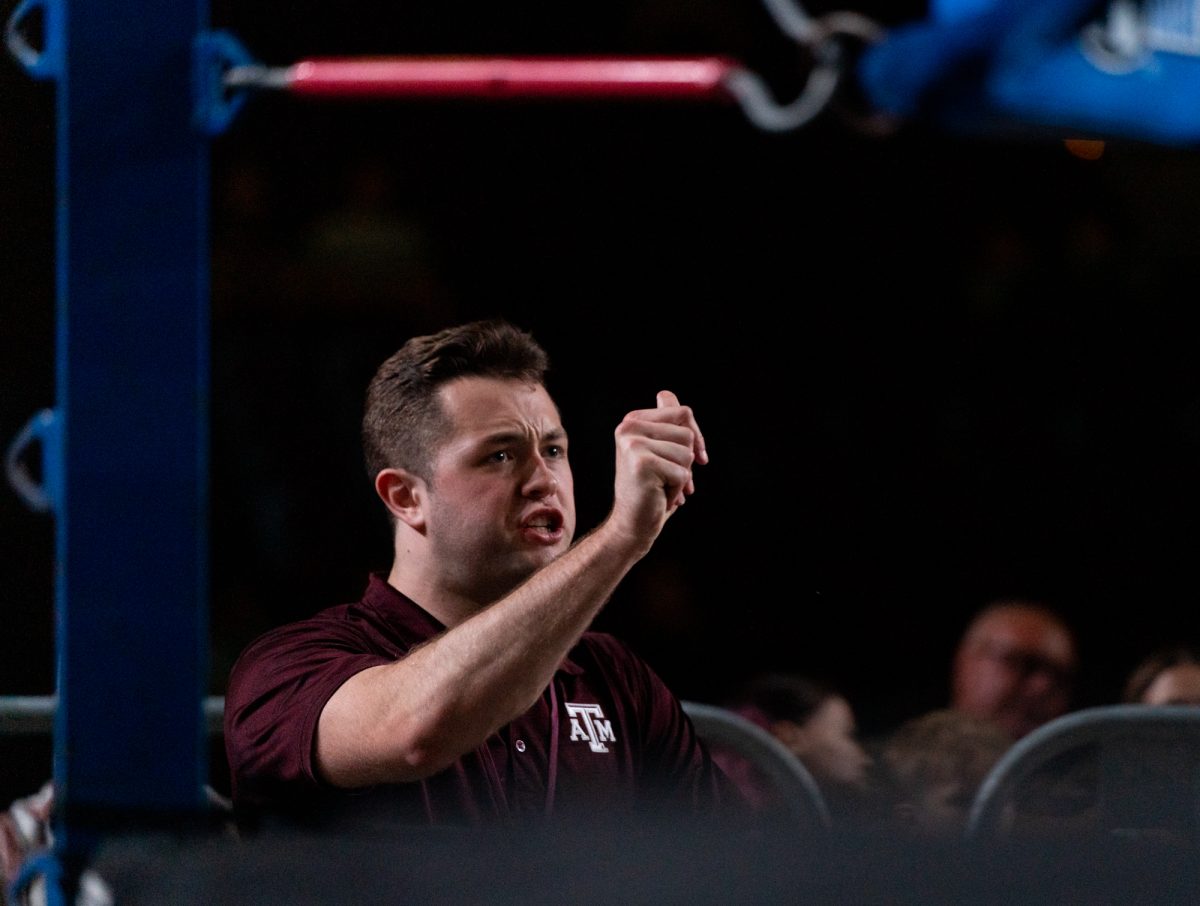 Blue Corner Coach Sage Stamper coaches during Farmers Fight Night, on Thursday, Apr. 4th, 2024, at Reed Arena.