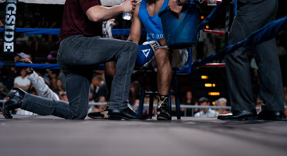 Light Heavyweight fighter Jake Zawaideh regroups in his corner during Farmers Fight Night, on Thursday, Apr. 4th, 2024, at Reed Arena.