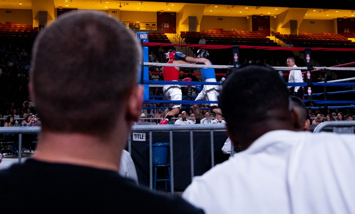 Fans watch Cruiserweight fighters Stadler Kirsten and Edward Clark fight during Farmers Fight Night on Thursday, April 4th, 2024, at Reed Arena.