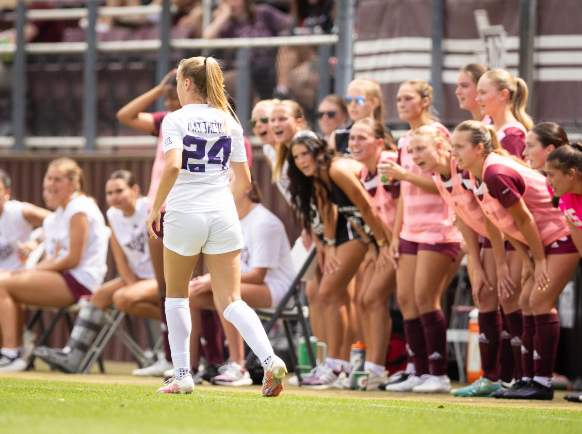 The Aggie bench yells at TCU Sophomore F Landen Matthews (24) during Texas A&Ms game against TCU on Sunday, April 7, 2024, at Ellis Field.