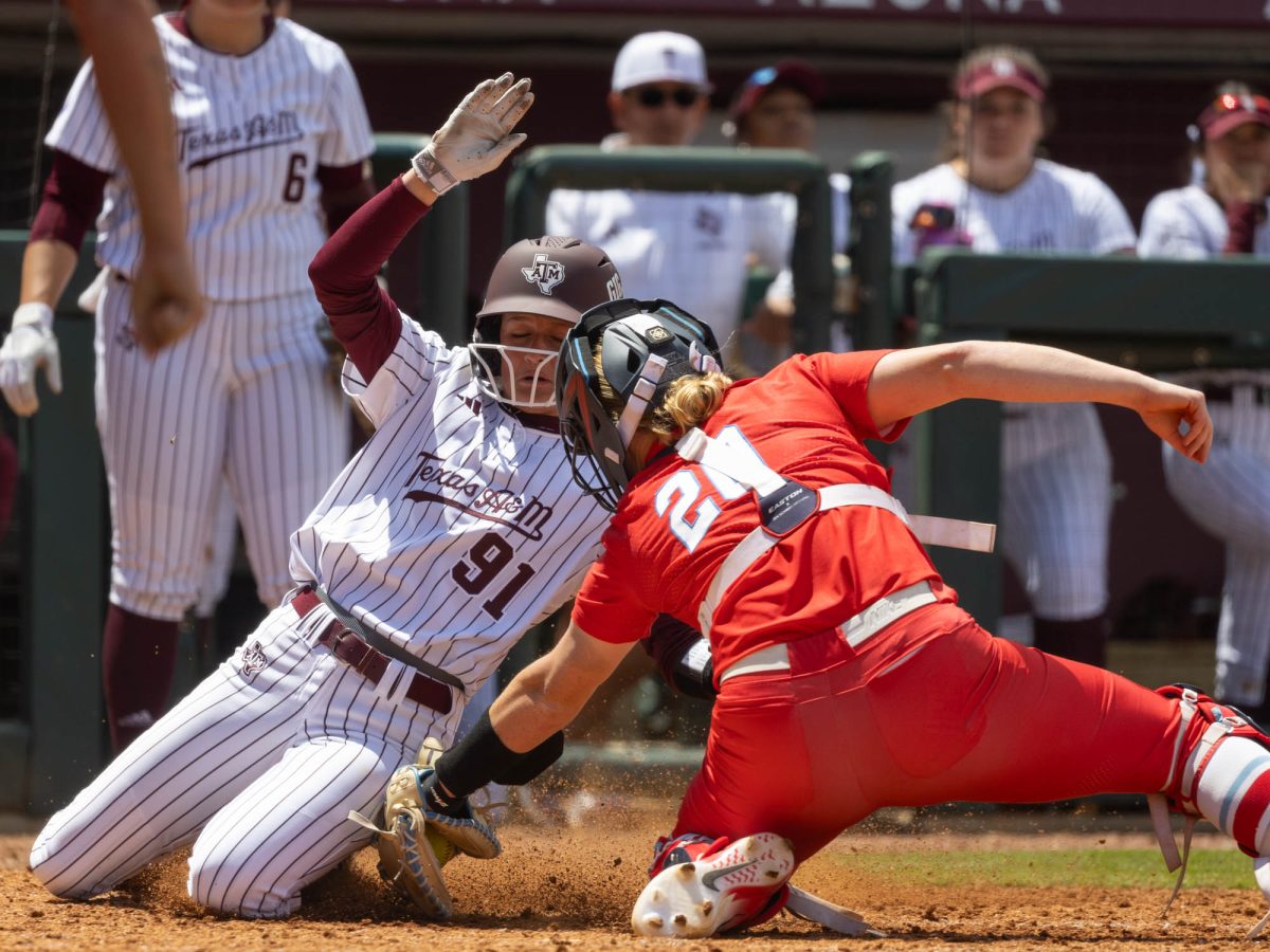Texas A&M outfielder Kramer Eschete (91) slides into home during Texas A&M’s game against Ole Miss on Sunday, April 21, 2024 at Davis Diamond. (Hannah Harrison/The Battalion)