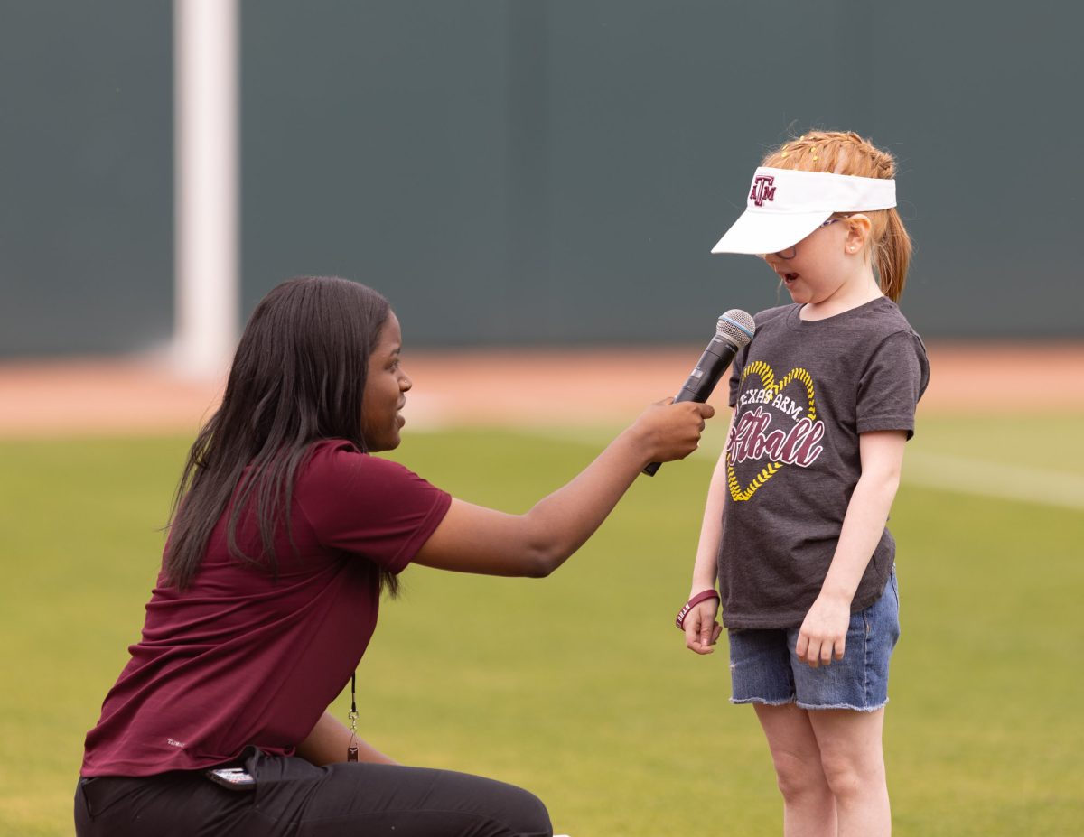 A little girl announces the play ball during Texas A&Ms game against Kentucky on April 7th, 2024 at Davis Diamond. (Jaime Rowe/The Battalion)