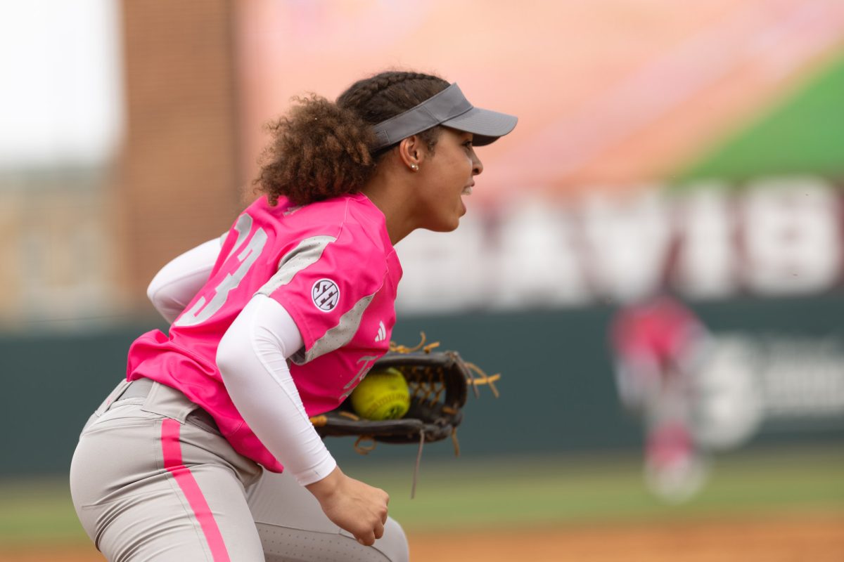 Sophomore INF Amari Harper (13) catches the ball on first base for an out during Texas A&Ms game against Kentucky on April 7th, 2024 at Davis Diamond. (Jaime Rowe/The Battalion)