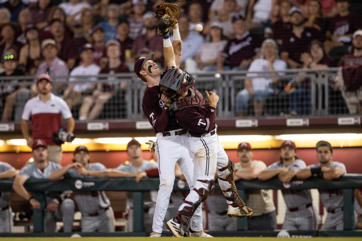 Texas A&M infielder Ted Burton (27) and catcher Jackson Appel (20) collide during Texas A&M’s game against Arkansas at Olsen Field on Friday, May 17, 2024. (CJ Smith/The Battalion)
