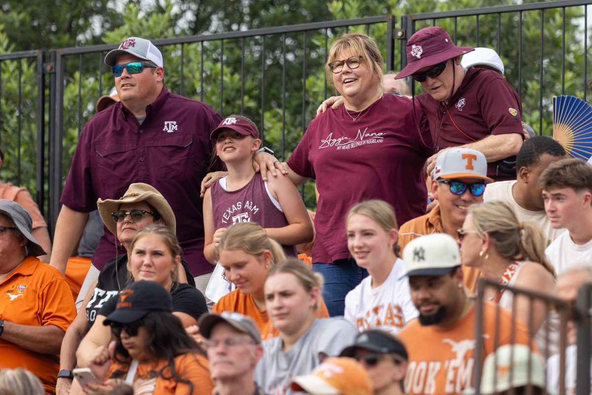 Texas A&M fans do the War Hymn before Texas A&M’s game against Texas at the Austin Super Regional at Red and Charline McCombs Field in Austin, Texas, on Friday, May 24, 2024. (CJ Smith/The Battalion)