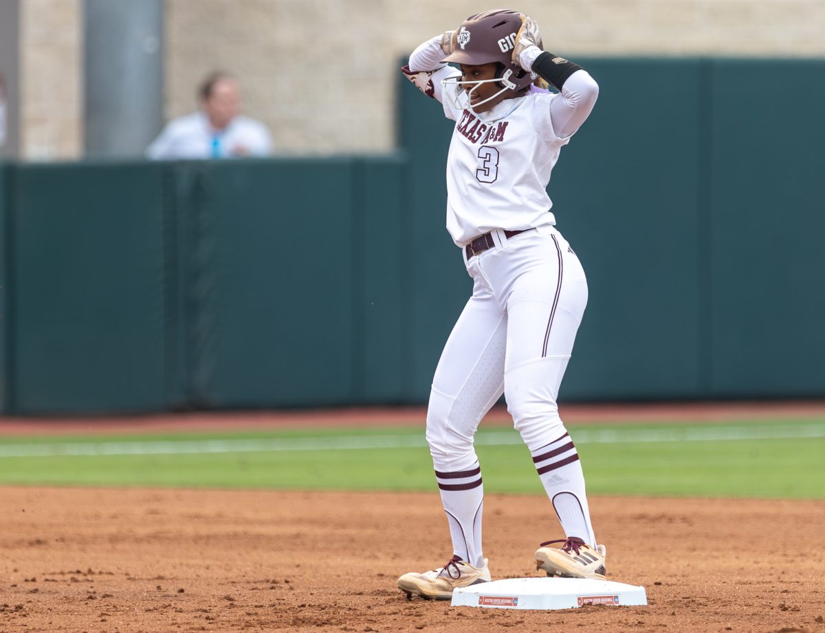 Texas A&M infielder Koko Wooley (3) dances during Texas A&M’s game against Texas at the Austin Super Regional at Red and Charline McCombs Field in Austin, Texas, on Friday, May 24, 2024. (CJ Smith/The Battalion)
