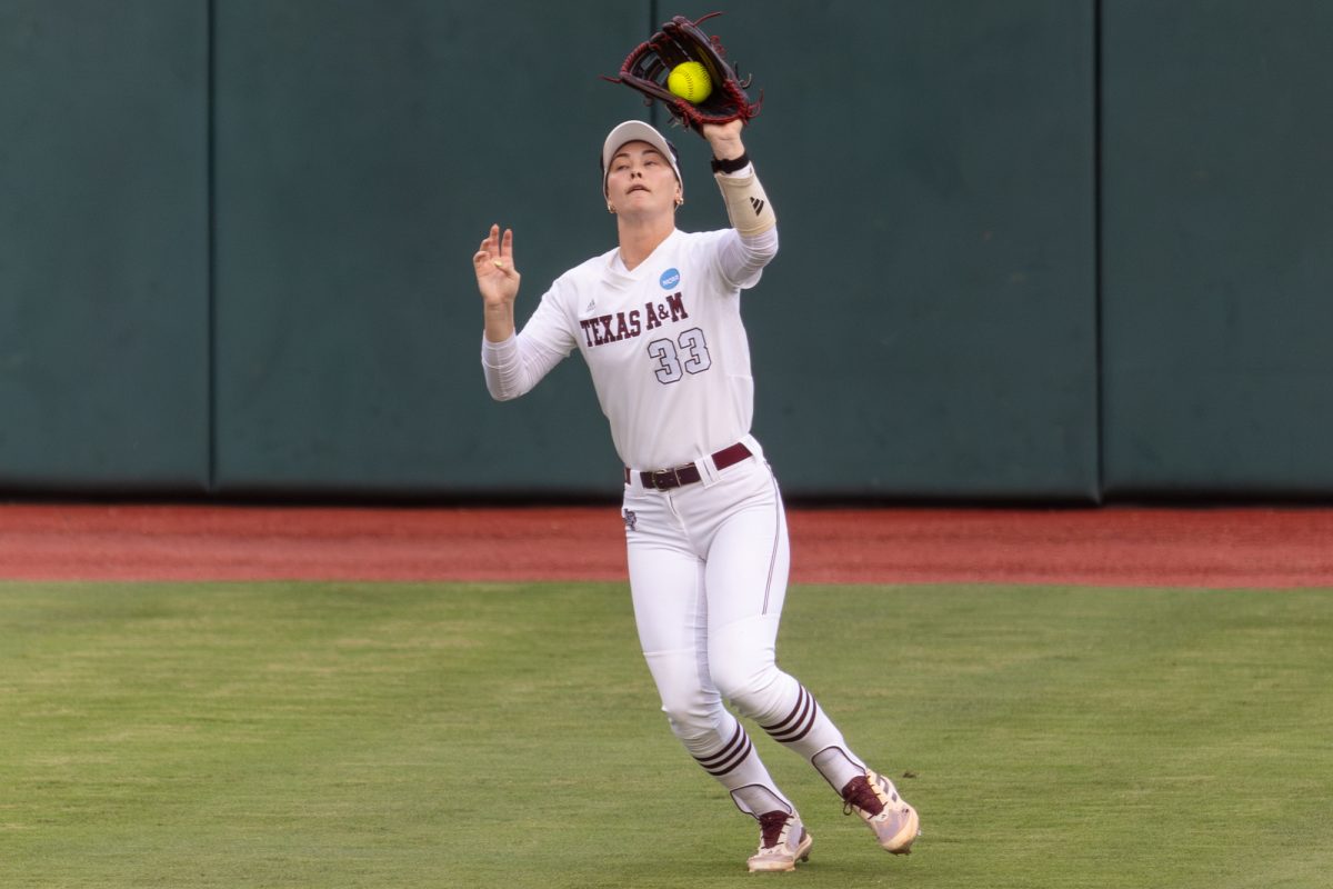 Texas A&M outfielder Allie Enright (33) catches a fly ball during Texas A&M’s game against Texas at the Austin Super Regional at Red and Charline McCombs Field in Austin, Texas, on Friday, May 24, 2024. (CJ Smith/The Battalion)