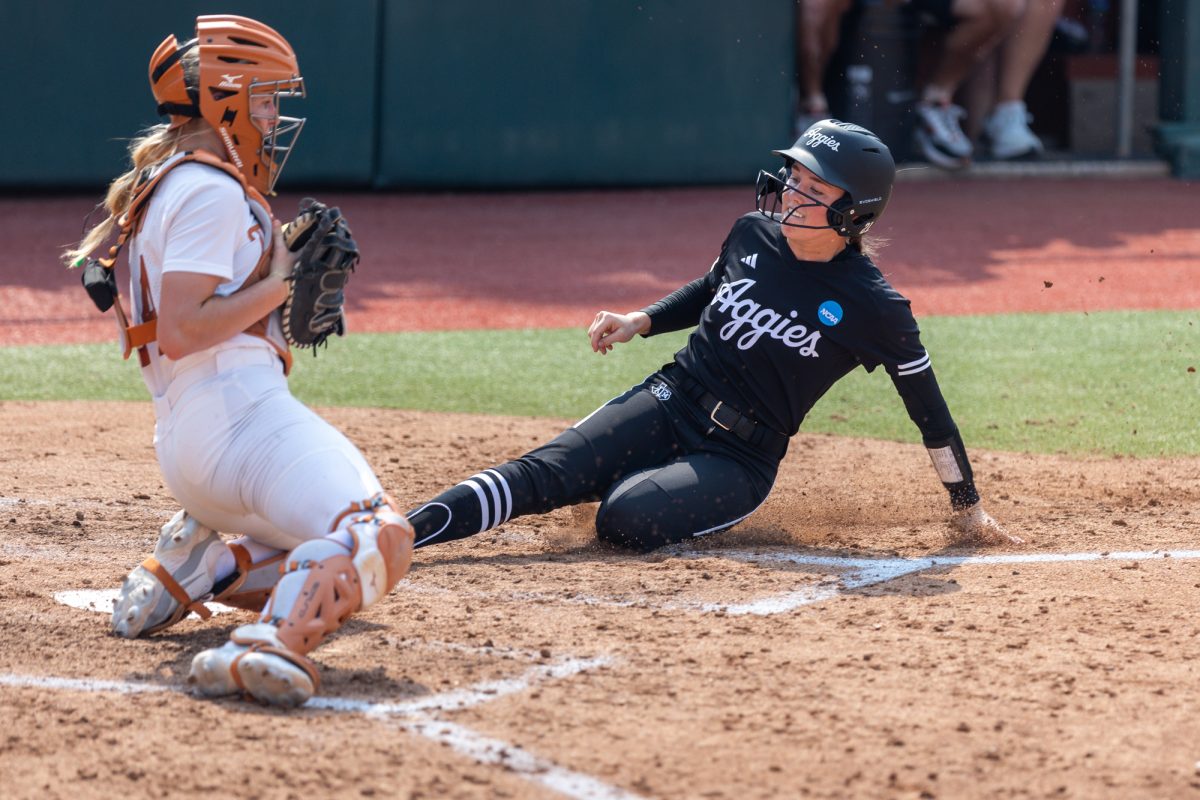Texas A&M utility Scout Lovell (21) slides into home plate during Texas A&M’s game against Texas at the Austin Super Regional at Red and Charline McCombs Field in Austin, Texas, on Saturday, May 25, 2024. (CJ Smith/The Battalion)
