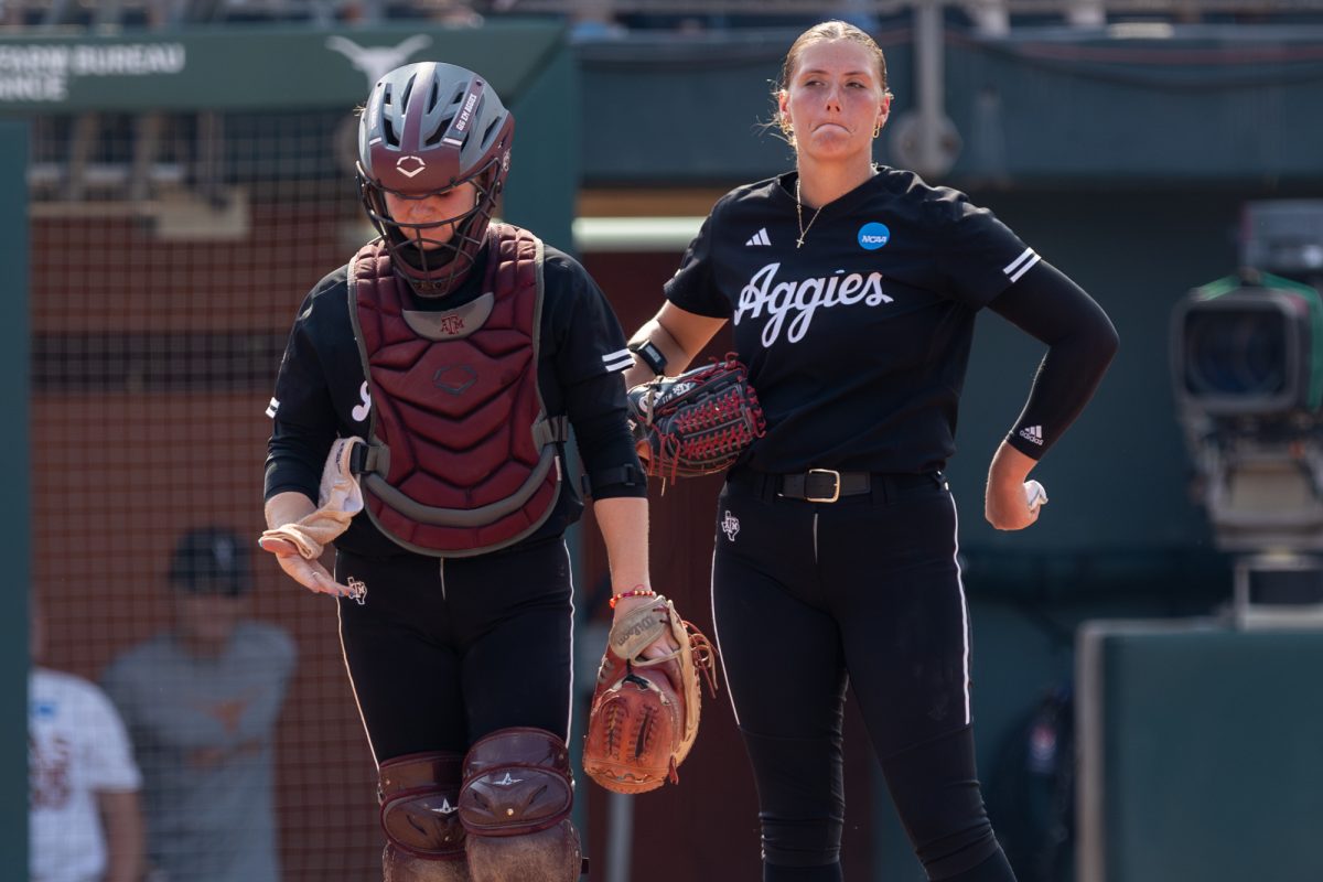Texas A&M catcher Julia Cottrill (42) and starting pitcher/relief pitcher Emiley Kennedy (11) during Texas A&M’s game against Texas at the Austin Super Regional at Red and Charline McCombs Field in Austin, Texas, on Saturday, May 25, 2024. (CJ Smith/The Battalion)