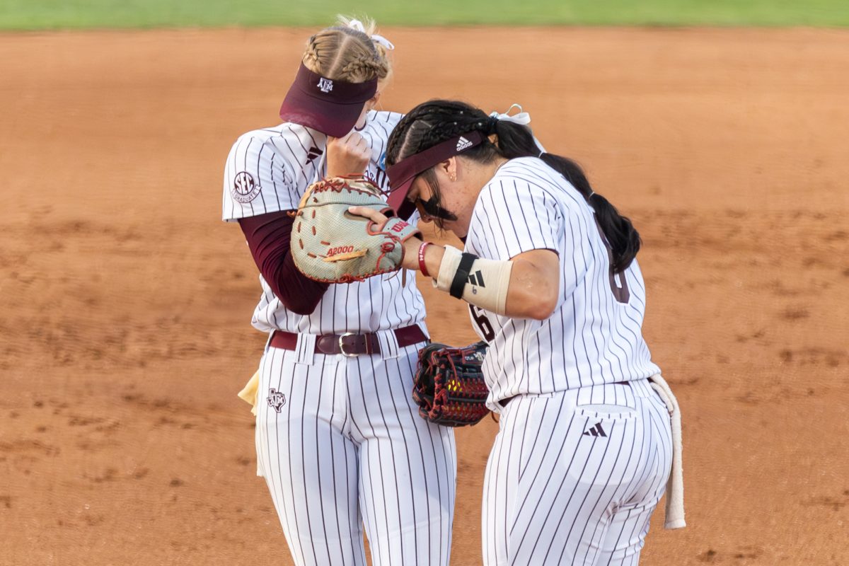 Texas A&M starting pitcher/relief pitcher Shaylee Ackerman (10) and infielder Trinity Cannon (6) talk during Texas A&M’s game against Texas at the Austin Super Regional at Red and Charline McCombs Field in Austin, Texas, on Sunday, May 26, 2024. (CJ Smith/The Battalion)