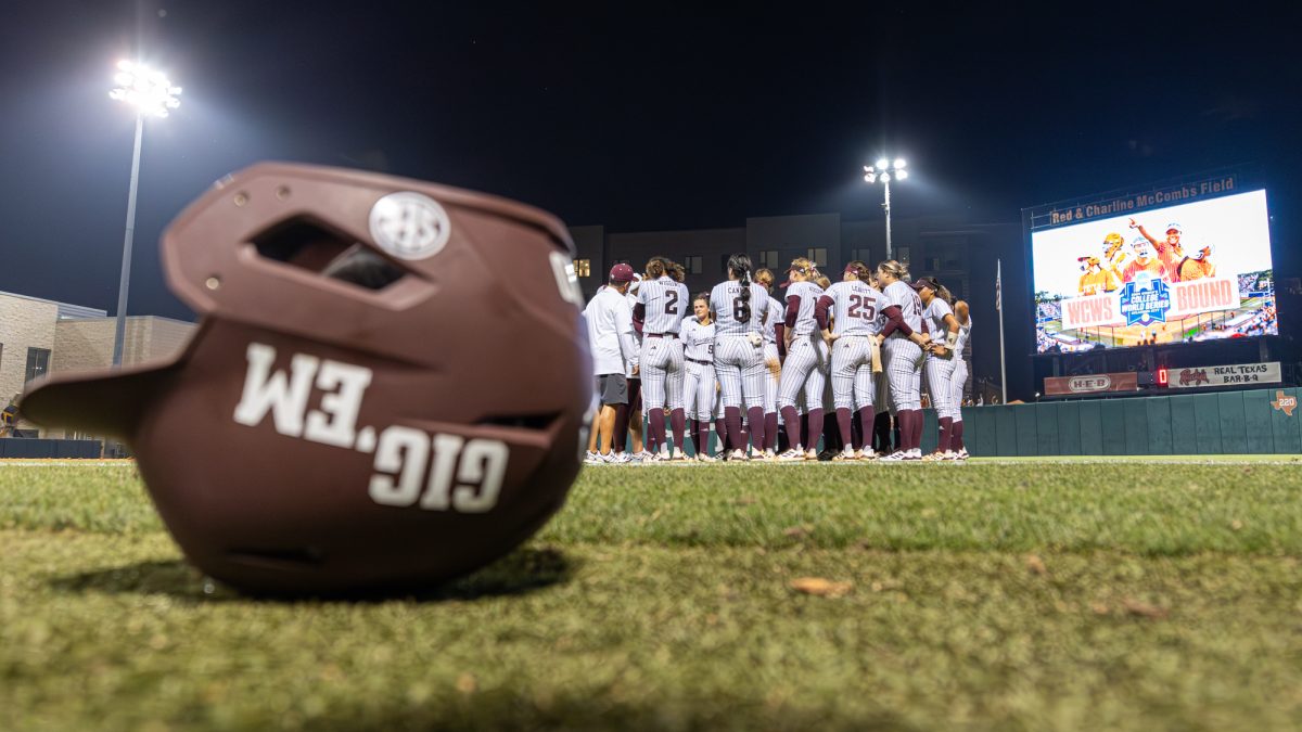 The Aggies huddle after Texas A&M’s game against Texas at the Austin Super Regional at Red and Charline McCombs Field in Austin, Texas, on Sunday, May 26, 2024. (CJ Smith/The Battalion)