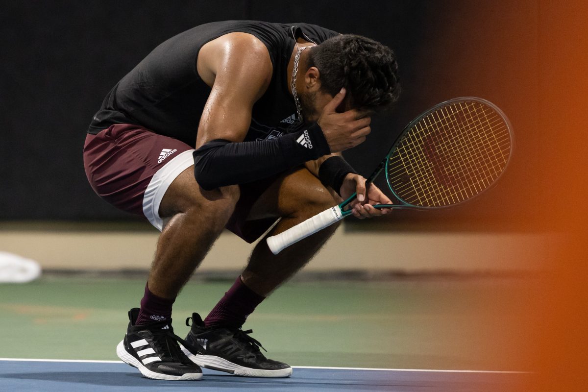 Sophomore Togan Tokac reacts after dropping a point during Texas A&M’s match against Texas at Texas Tennis Center in Austin on Friday, May 10, 2024. (Chris Swann/The Battalion)