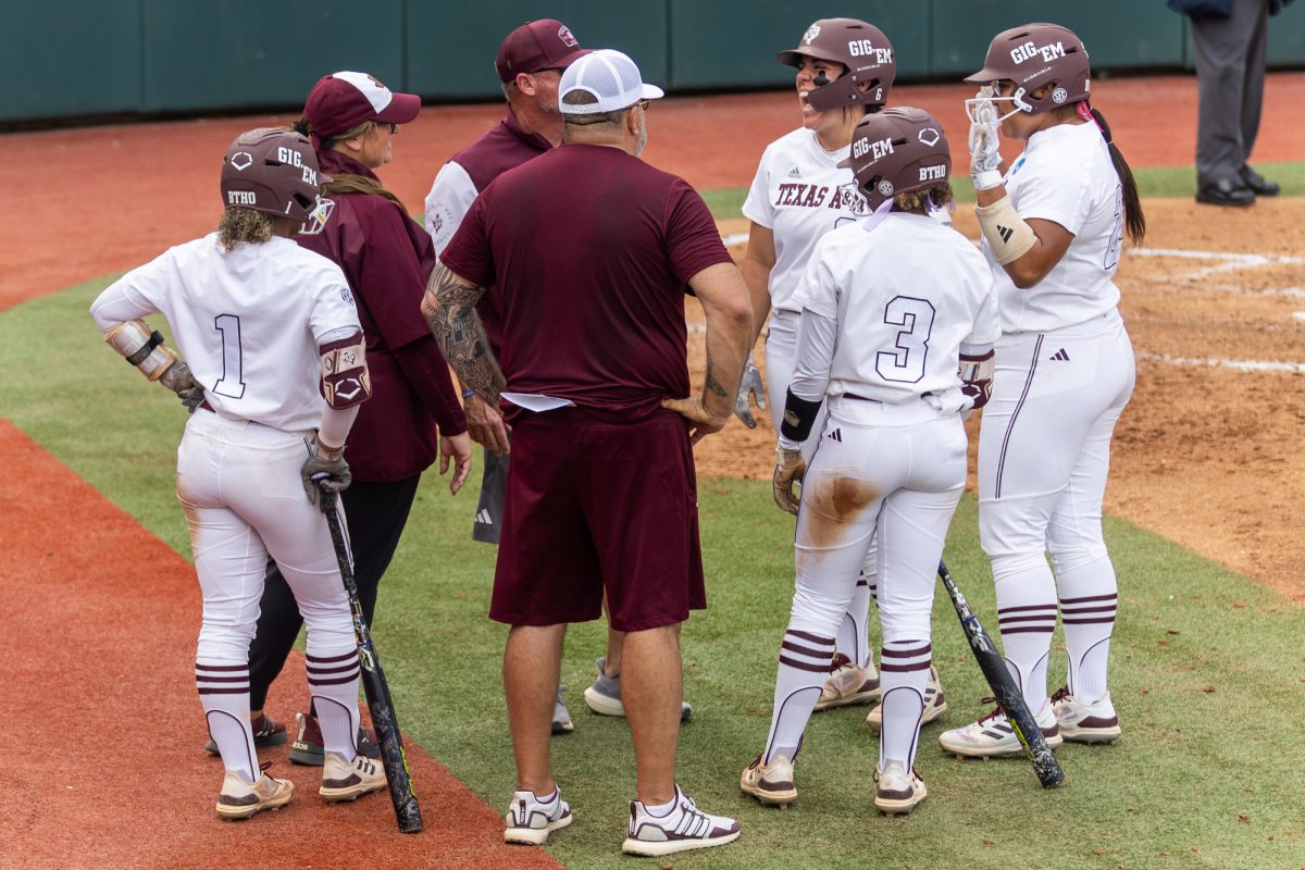 The Aggies talk during Texas A&M’s game against Texas at the Austin Super Regional at Red and Charline McCombs Field in Austin, Texas, on Friday, May 24, 2024. (CJ Smith/The Battalion)