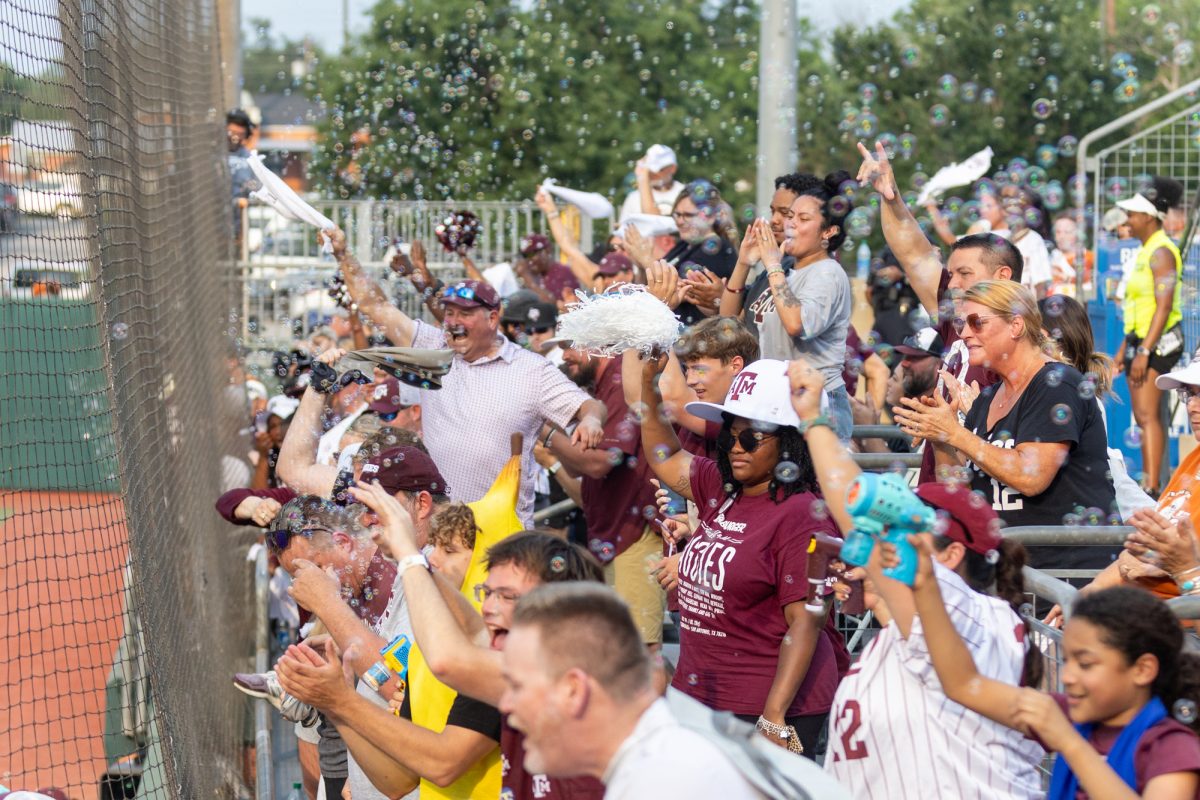 Fans react to a home-run during Texas A&M’s game against Texas at the Austin Super Regional at Red and Charline McCombs Field in Austin, Texas, on Friday, May 24, 2024. (CJ Smith/The Battalion)