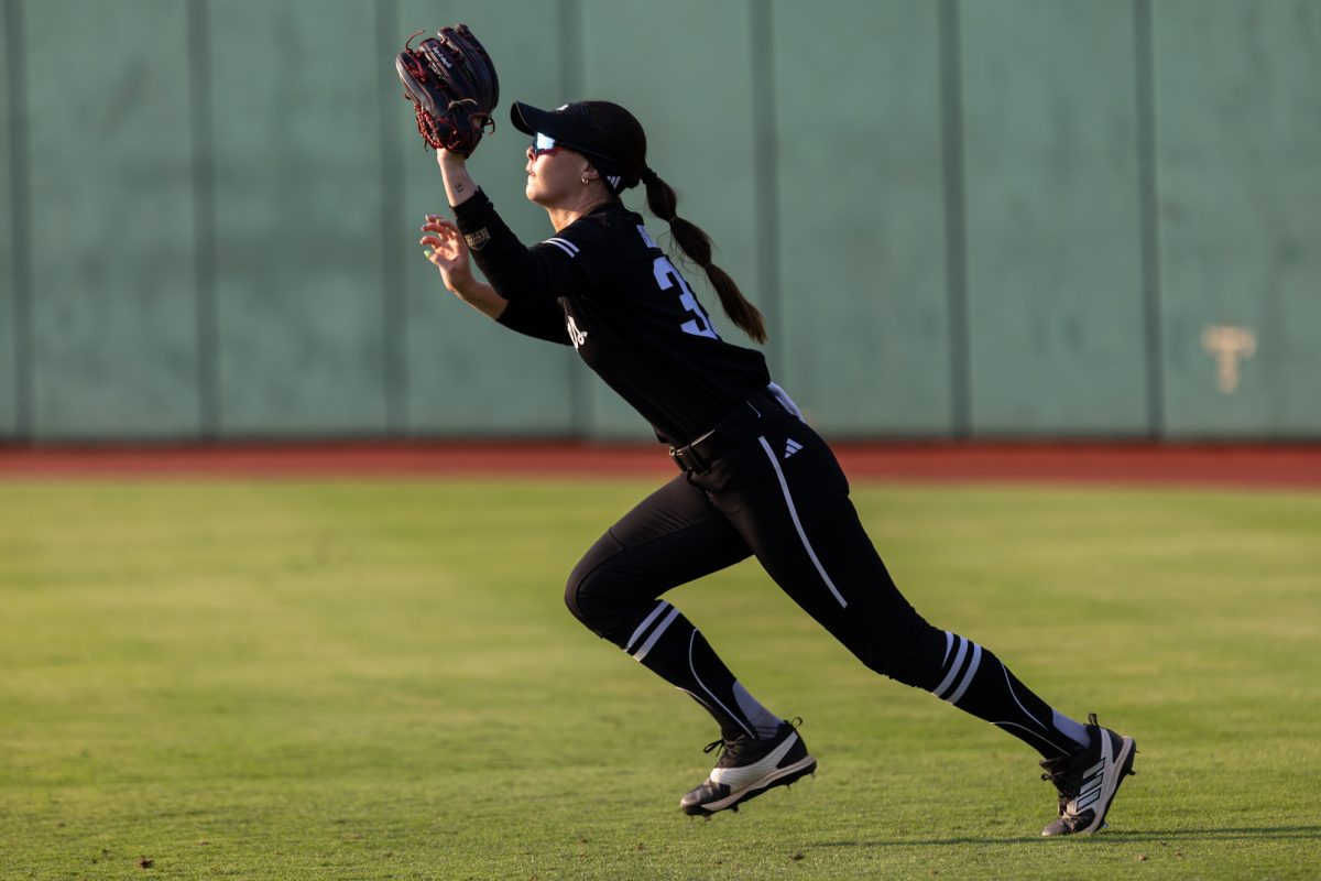 Texas A&M outfielder Allie Enright (33) catches the ball during Texas A&M’s game against Texas at the Austin Super Regional at Red and Charline McCombs Field in Austin, Texas, on Saturday, May 25, 2024. (CJ Smith/The Battalion)