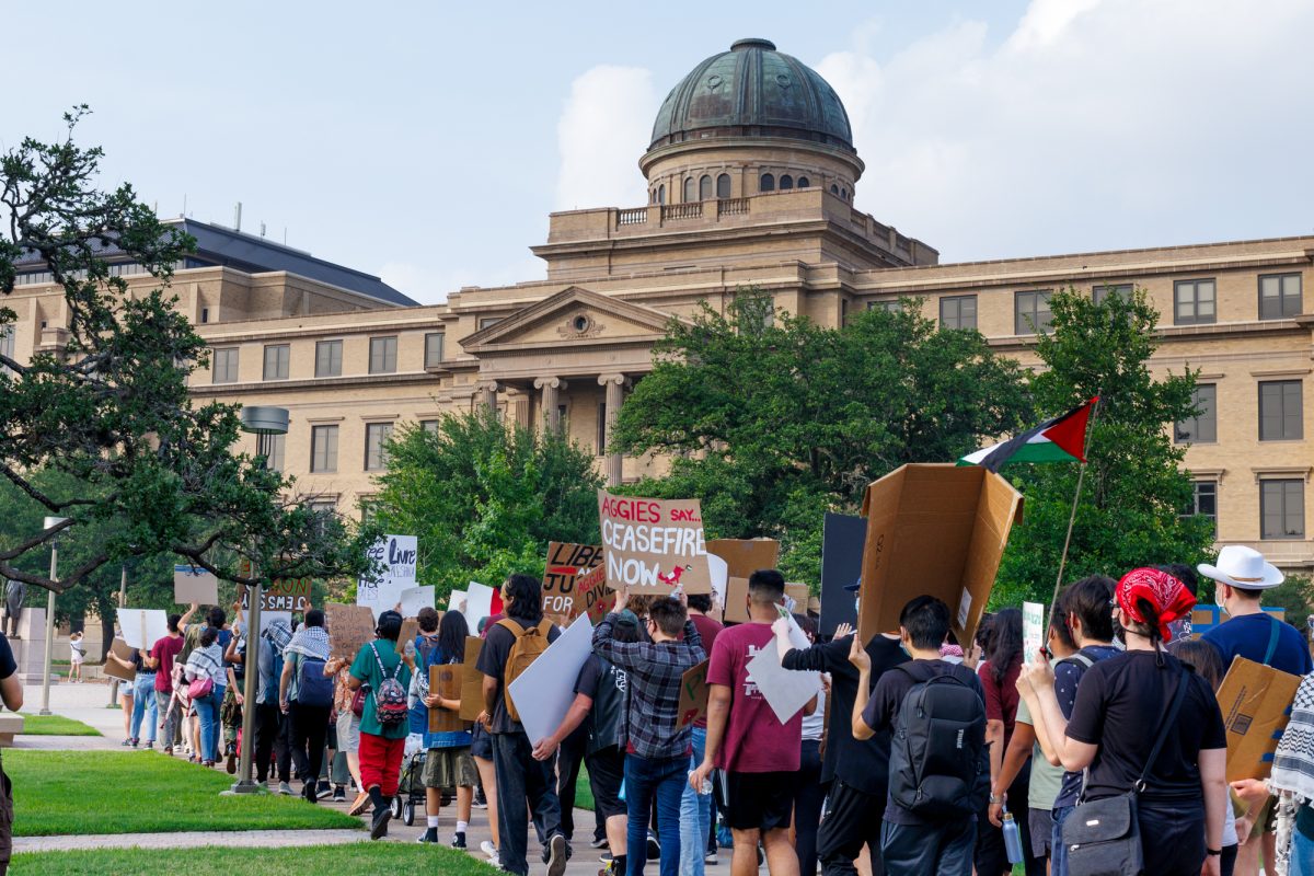 Demostrators march towards the academic plaza during the free Palestine protest on May 7, 2024. (Samuel Falade/The Battalion)