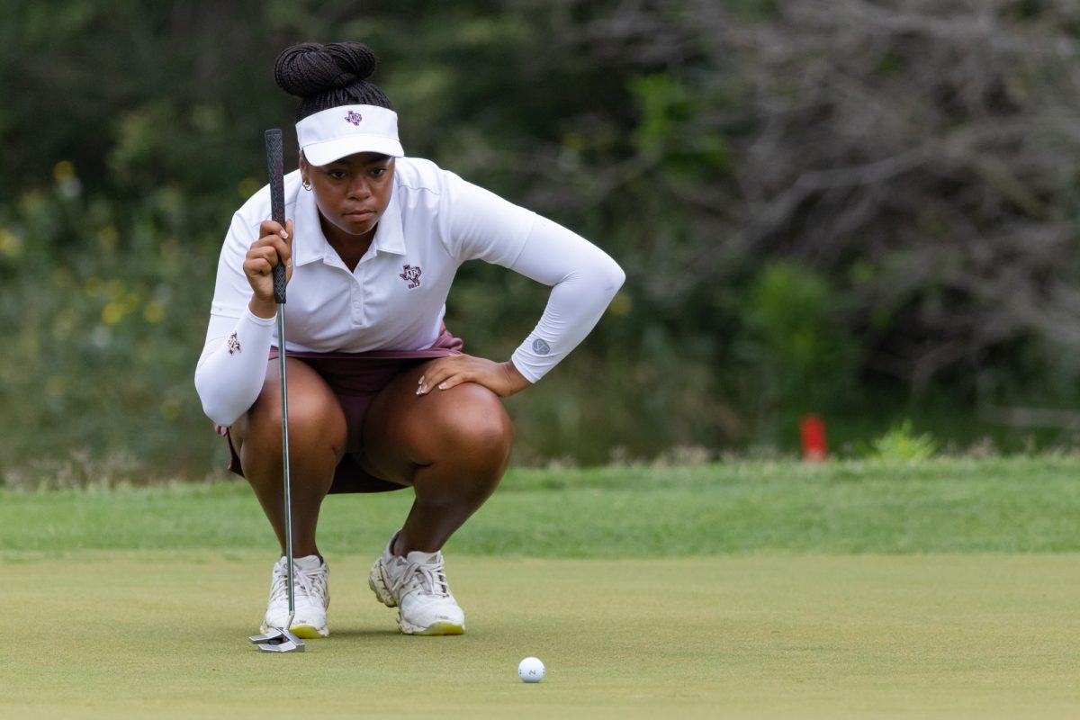 Senior Zoie Slaughter lines up her shot during the Bryan Regional of the NCAA Women’s Golf Championship at Traditions Golf Club on Monday, May 6, 2024. (Chris Swann/ The Battalion)