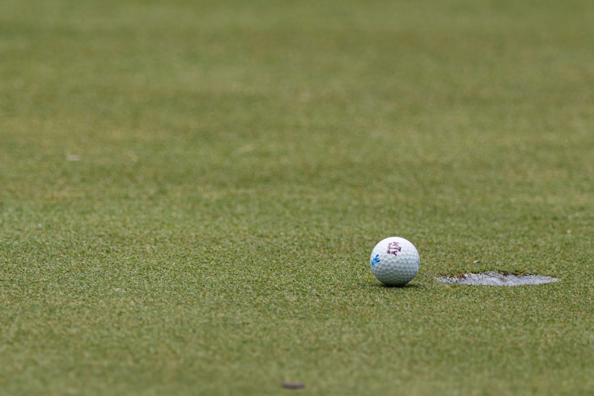 An A&M ball rolls past the hole during the Bryan Regional of the NCAA Women’s Golf Championship at Traditions Golf Club on Monday, May 6, 2024. (Chris Swann/ The Battalion)