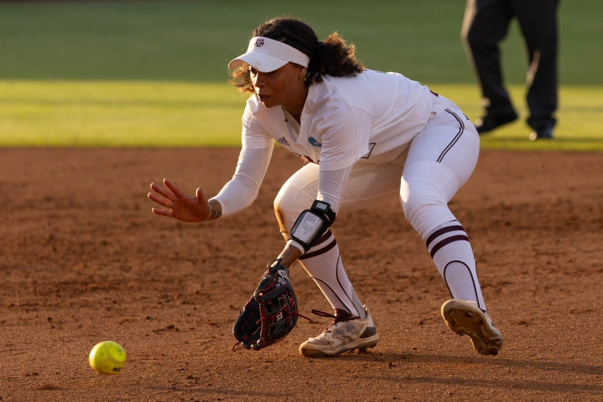 Texas A&M infielder Rylen Wiggins (2) makes a catch during Texas A&M’s game against UAlbany at the first round of the NCAA Women’s College World Series at Davis Diamond on Friday, May 18, 2024. (Hannah Harrison/The Battalion)