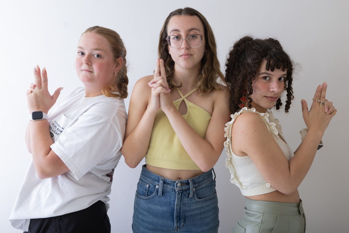 The Editor-in-Chiefs of The Aggieland Yearbook, The Battalion, and Maroon Life magazine pose for a photo in The Battalion office studio on Wednesday, May 1, 2024. (Chris Swann/The Battalion)