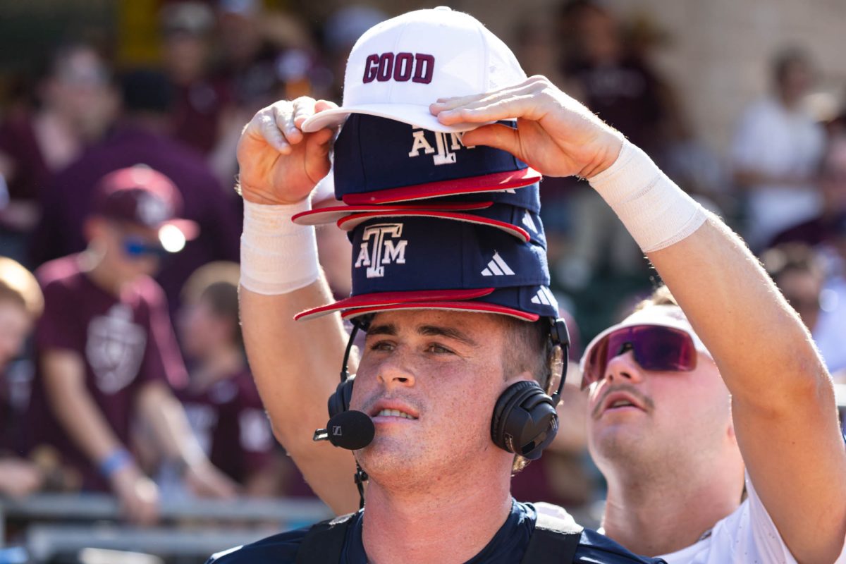 Texas A&M infielder Ryan Targac (12) talks to a tv crew after Texas A&M’s game against Arkansas at Olsen Field on Friday, May 18, 2024. (Hannah Harrison/The Battalion)