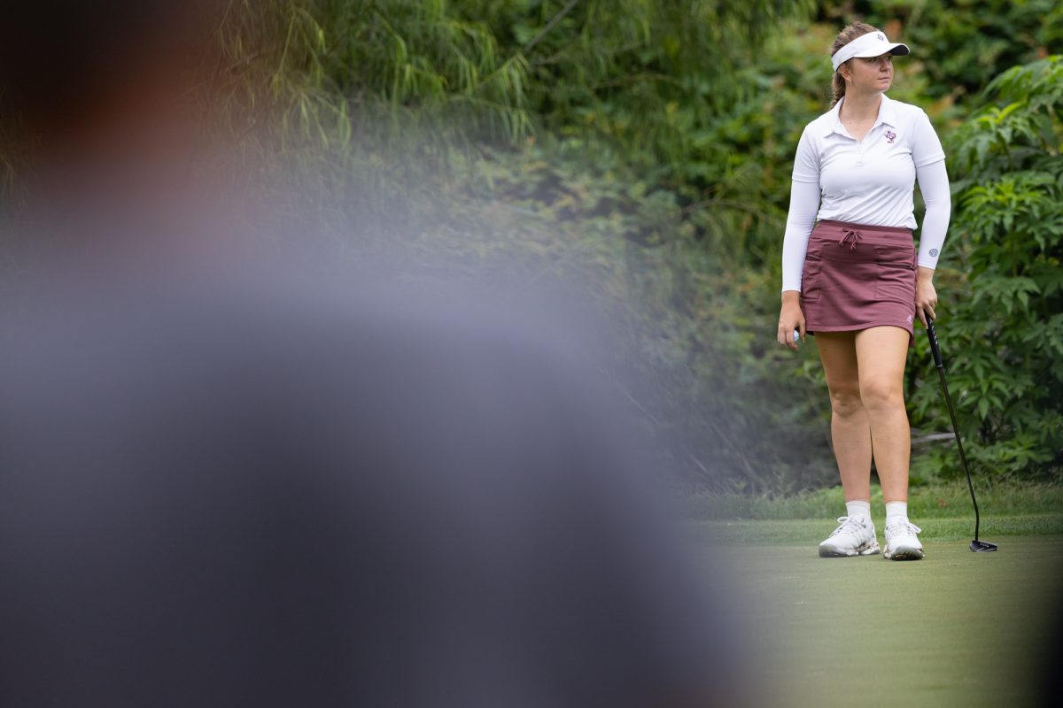 Junior Adela Cernousek waits her turn to putt during the Bryan Regional of the NCAA Women’s Golf Championship at Traditions Golf Club on Monday, May 6, 2024. (Chris Swann/ The Battalion)