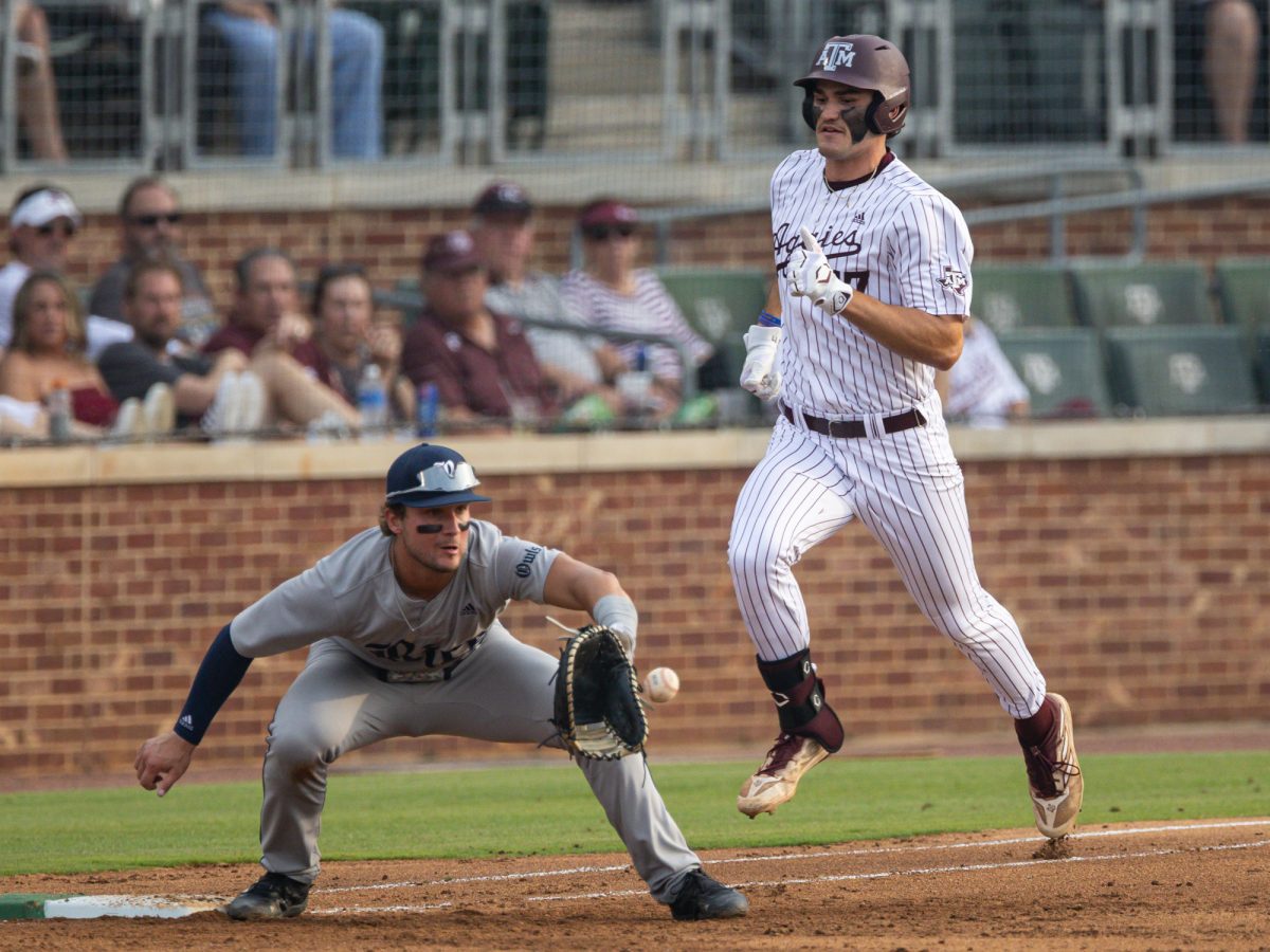 Rice utility Treyton Rank (20) catches the ball for an out during Texas A&M’s game against Rice at Olsen Field on Tuesday, May 7, 2024. (Chris Swann/The Battalion)