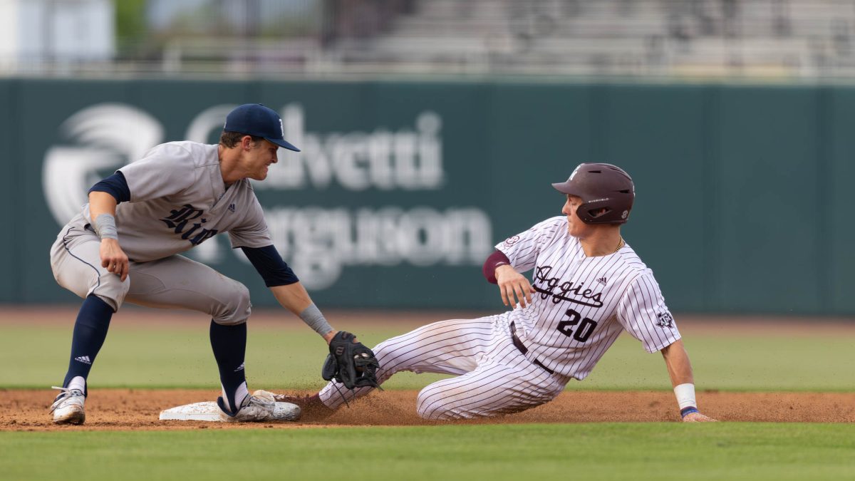 Texas A&M catcher Jackson Appel (20) sliding into second base during Texas A&M’s game against Rice at Olsen Field on Tuesday, May 7, 2024. (Hannah Harrison/The Battalion)