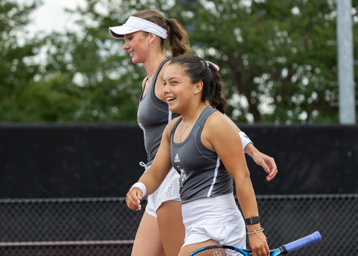 Freshman Lucciana Perez and Senior Carson Branstine celebrate after their doubles win during Texas A&Ms match against A&M Corpus Christi in the NCAA Womens Tennis tournament at Mitchell Tennis Center on Saturday, May 4, 2024. (Adriano Espinosa/The Battalion)