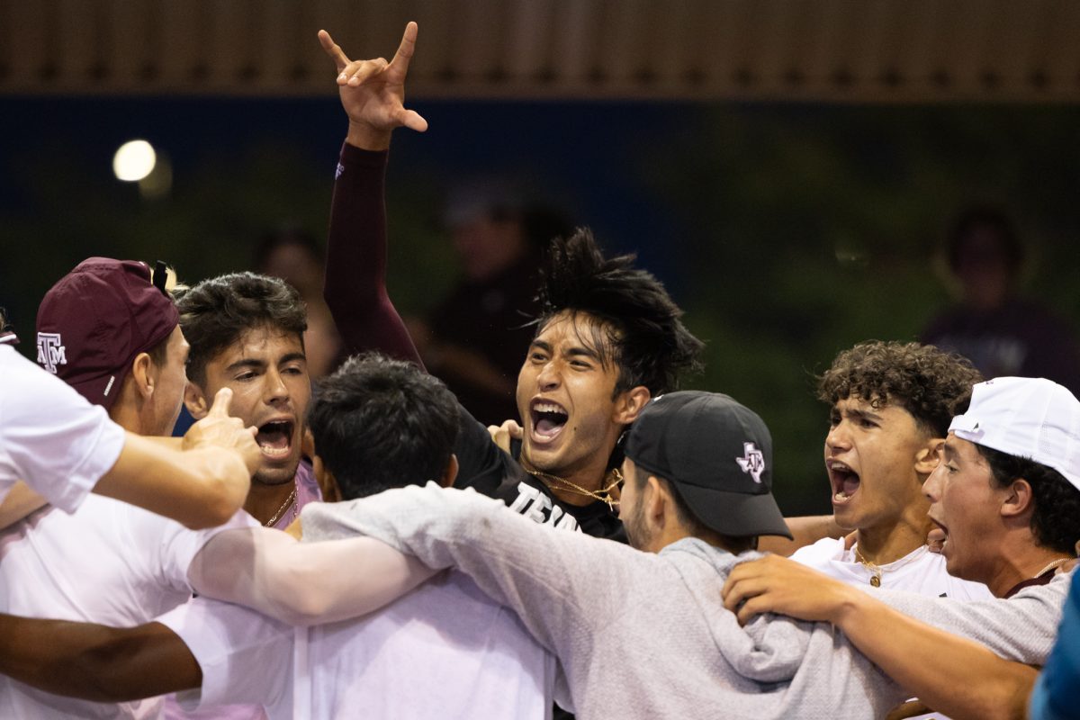 The Aggies react after junior J.C. Roddick’s game-winning set during Texas A&M’s match against San Diego in the second round of the NCAA Men’s Tennis Regional at Mitchell Tennis Center on Saturday, May 4, 2024. (Chris Swann/The Battalion)