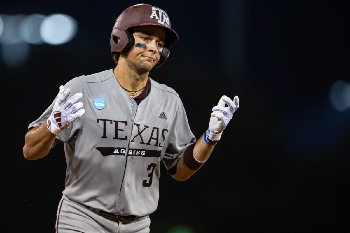 Texas A&M infielder Kaeden Kent (3) reacts after hitting a grand-slam to take the lead during Texas A&M’s game against Oregon at the NCAA Bryan-College Station Super Regional at Olsen Field on Sunday, June 9, 2024. (CJ Smith/The Battalion)