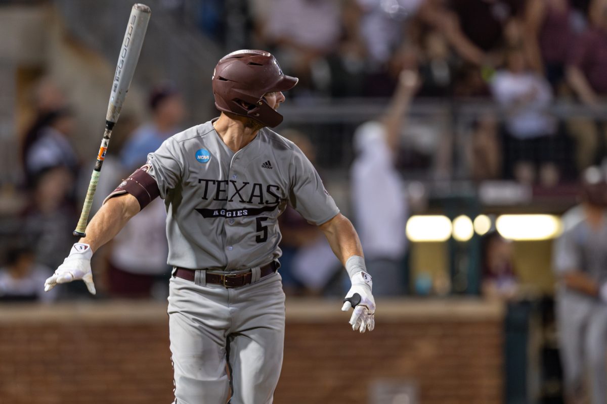 Texas A&M outfielder Hayden Schott (5) flips his bat during Texas A&M’s game against Oregon at the NCAA Bryan-College Station Super Regional at Olsen Field on Sunday, June 9, 2024. (CJ Smith/The Battalion)