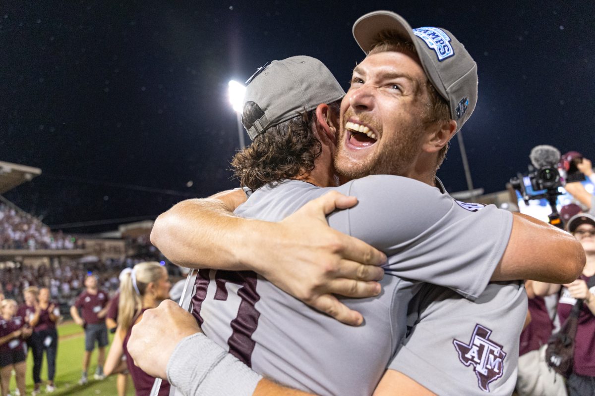 Texas A&M outfielder Hayden Schott (5) and outfielder Jace Laviolette (17) react after The Aggies win the NCAA Bryan-College Station Super Regional at Olsen Field on Sunday, June 9, 2024. (CJ Smith/The Battalion)