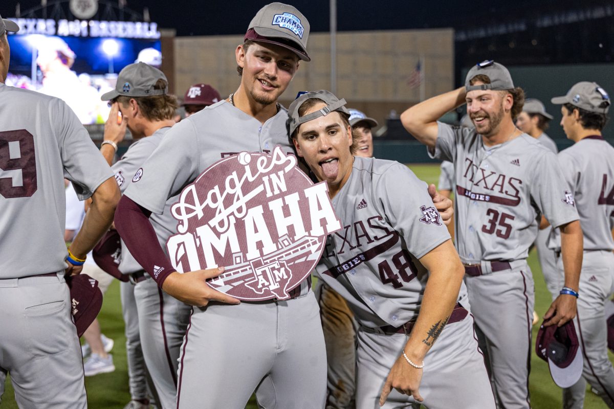 Texas A&M utility Blake Binderup (46) and catcher Hank Bard (48) pose for a picture after The Aggies win the NCAA Bryan-College Station Super Regional at Olsen Field on Sunday, June 9, 2024. (CJ Smith/The Battalion)