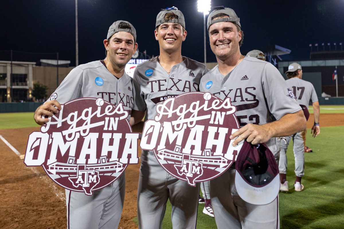 Texas A&M pitcher Ryan Prager (18), pitcher Justin Lamkin (33), and pitcher Evan Aschenbeck (53) pose for a picture after The Aggies win the NCAA Bryan-College Station Super Regional at Olsen Field on Sunday, June 9, 2024. (CJ Smith/The Battalion)