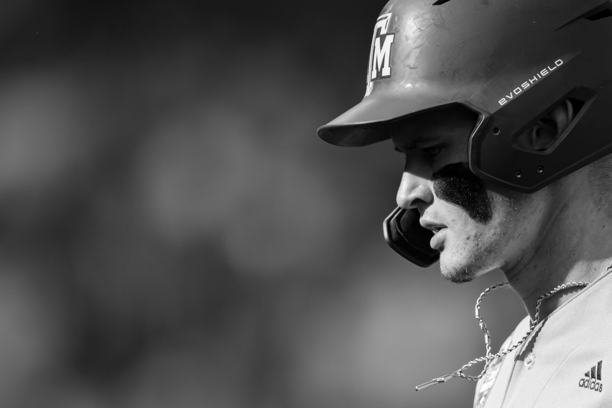Texas A&M outfielder Caden Sorrell (13) returns to the dugout during Texas A&M’s game against Kentucky at the NCAA Men’s College World Series at in Omaha, Nebraska on Monday, June 17, 2024. (Chris Swann/The Battalion)