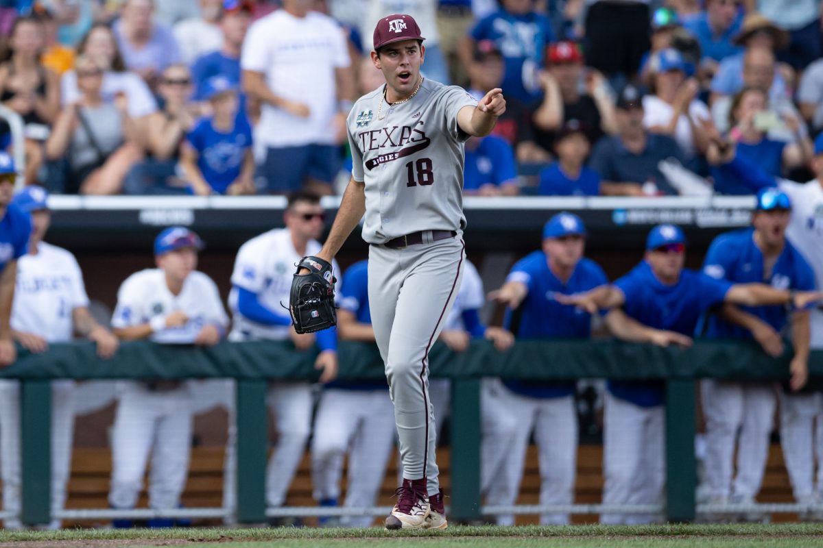 Texas A&M pitcher Ryan Prager (18) reacts after catcher Jackson Appel (20) makes a play for an out during Texas A&M’s game against Kentucky at the NCAA Men’s College World Series at in Omaha, Nebraska on Monday, June 17, 2024. (Chris Swann/The Battalion)