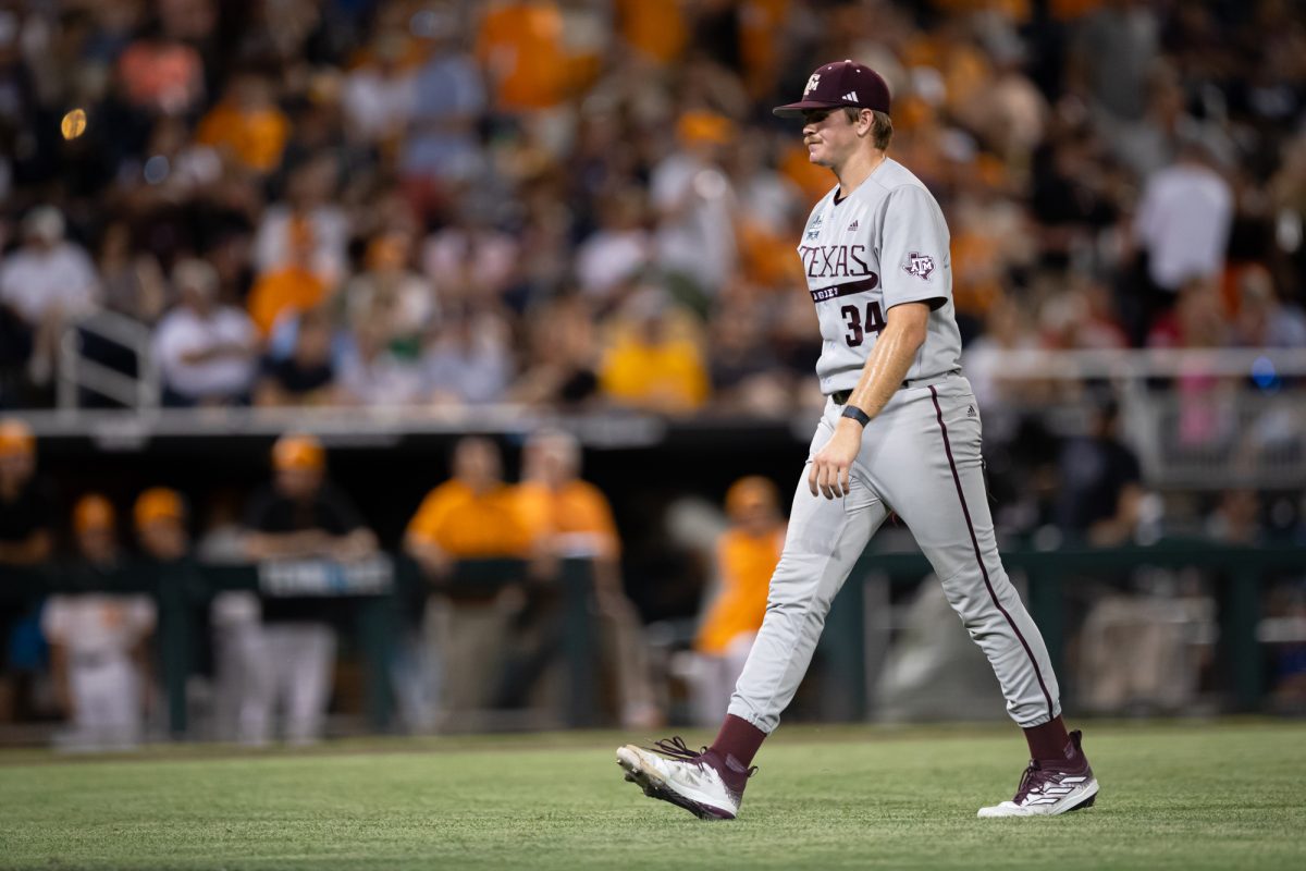 Texas A&M pitcher Josh Stewart (34) walks back to the dugout after being pulled during Texas A&M’s game against Tennessee at the NCAA Men’s College World Series finals at Charles Schwab Field in Omaha, Nebraska on Saturday, June 22, 2024. (Chris Swann/The Battalion)