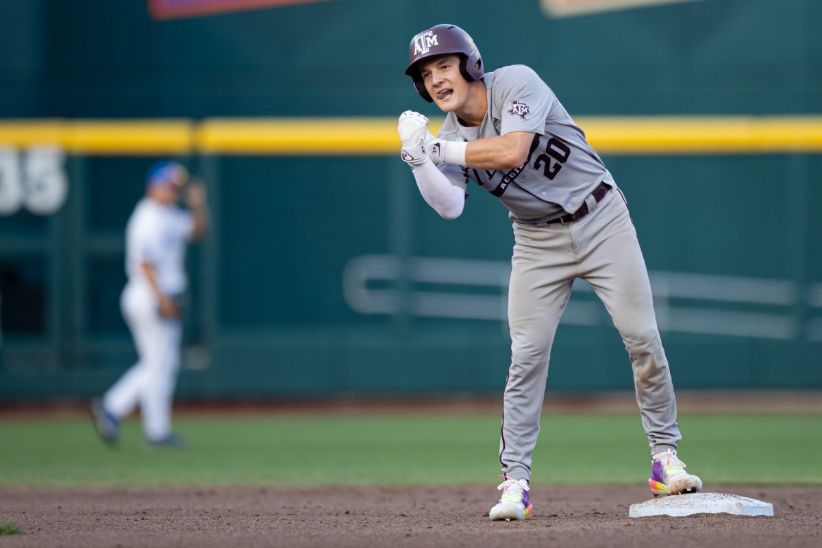 Texas A&M catcher Jackson Appel (20) reacts after hitting a double during Texas A&M’s game against Kentucky at the NCAA Men’s College World Series at in Omaha, Nebraska on Monday, June 17, 2024. (Chris Swann/The Battalion)