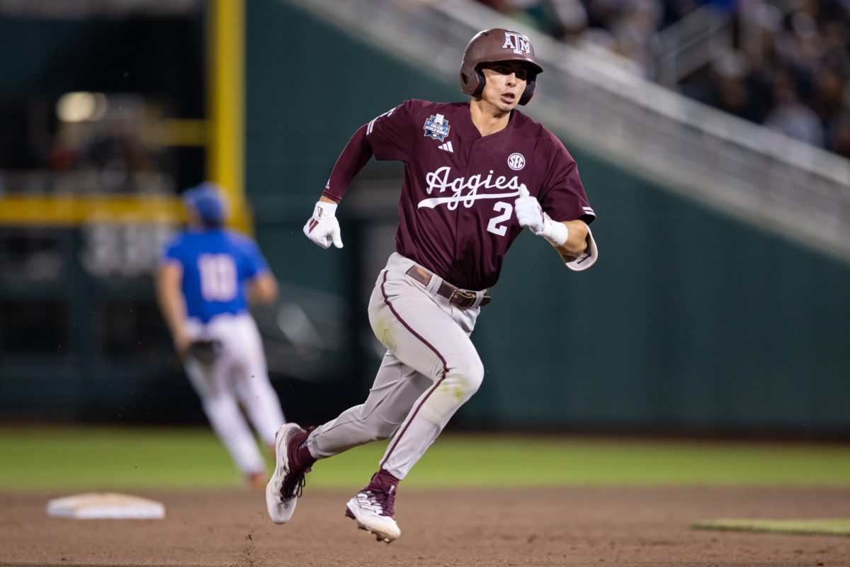 Texas A&M infielder Ali Camarillo (2) runs to third base during Texas A&M’s game against Florida at the NCAA Men’s College World Series semifinals at Charles Schwab Field in Omaha, Nebraska on Wednesday, June 19, 2024. (Chris Swann/The Battalion)