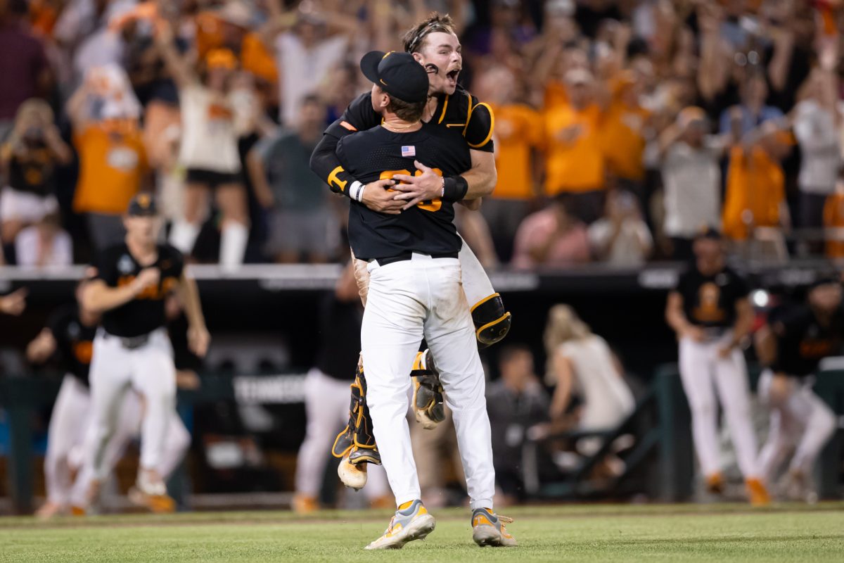 Tennessee pitcher Aaron Combs (28) and catcher Cal Stark (10) react after the final strikeout to win the National Championship after Tennessee’s win against Texas A&M at the NCAA Men’s College World Series finals at Charles Schwab Field in Omaha, Nebraska on Monday, June 24, 2024. (Chris Swann/The Battalion)