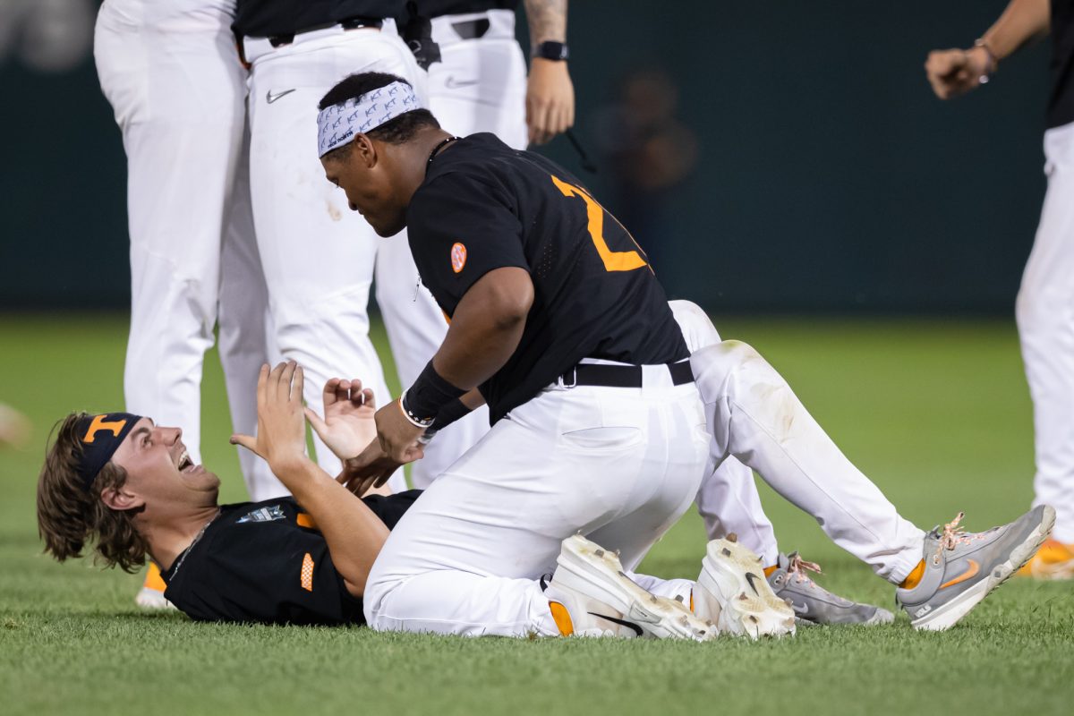 Tennessee pitcher Zander Sechrist (48) and Tennessee outfielder Kavares Tears (21) after Tennessee’s win against Texas A&M at the NCAA Men’s College World Series finals at Charles Schwab Field in Omaha, Nebraska on Monday, June 24, 2024. (Chris Swann/The Battalion)