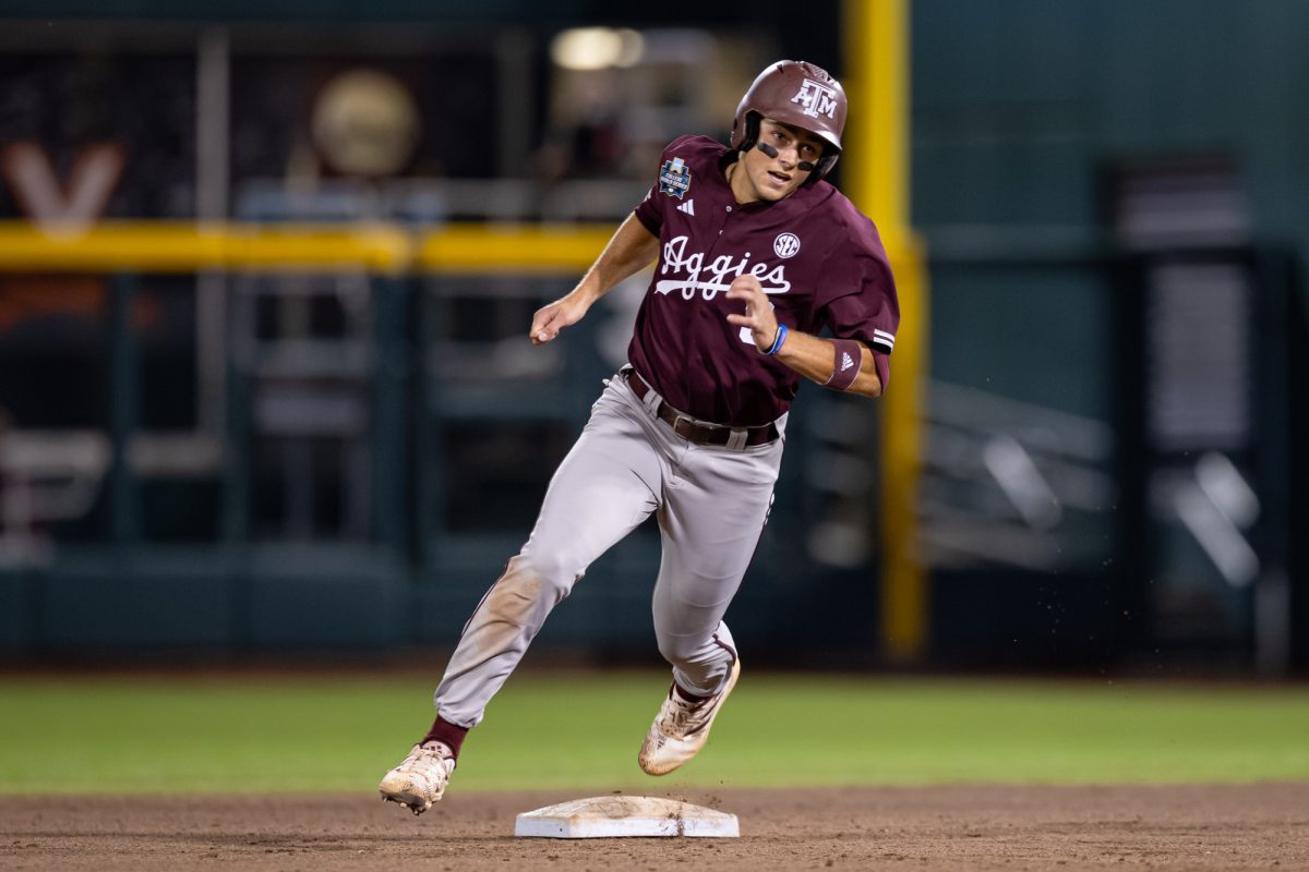 Texas A&M infielder Kaeden Kent (3) rounds second base during Texas A&M’s game against Florida at the NCAA Men’s College World Series semifinals at Charles Schwab Field in Omaha, Nebraska on Wednesday, June 19, 2024. (Chris Swann/The Battalion)