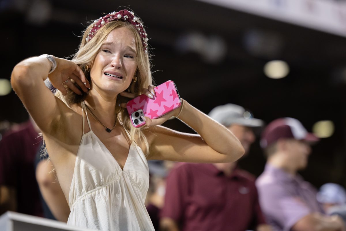 A fan reacts after Texas A&M’s loss against Tennessee at the NCAA Men’s College World Series finals at Charles Schwab Field in Omaha, Nebraska on Monday, June 24, 2024. (Chris Swann/The Battalion)