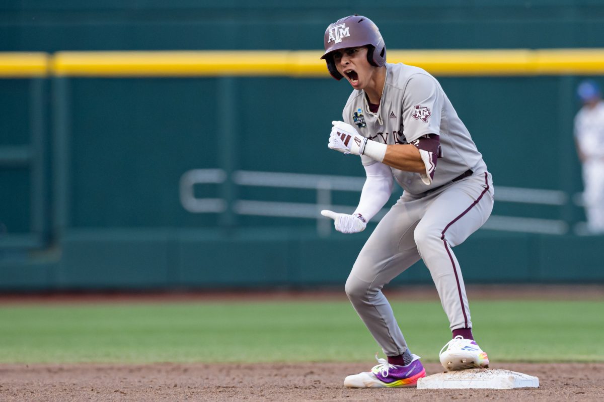 Texas A&M infielder Ali Camarillo (2) reacts after hitting a double during Texas A&M’s game against Kentucky at the NCAA Men’s College World Series at in Omaha, Nebraska on Monday, June 17, 2024. (Chris Swann/The Battalion)