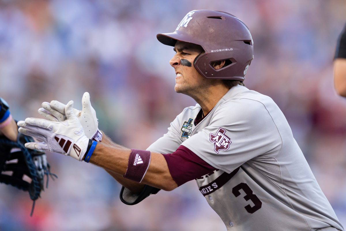 Texas A&M infielder Kaeden Kent (3) reacts after hitting a single during Texas A&M’s game against Kentucky at the NCAA Men’s College World Series at in Omaha, Nebraska on Monday, June 17, 2024. (Chris Swann/The Battalion)