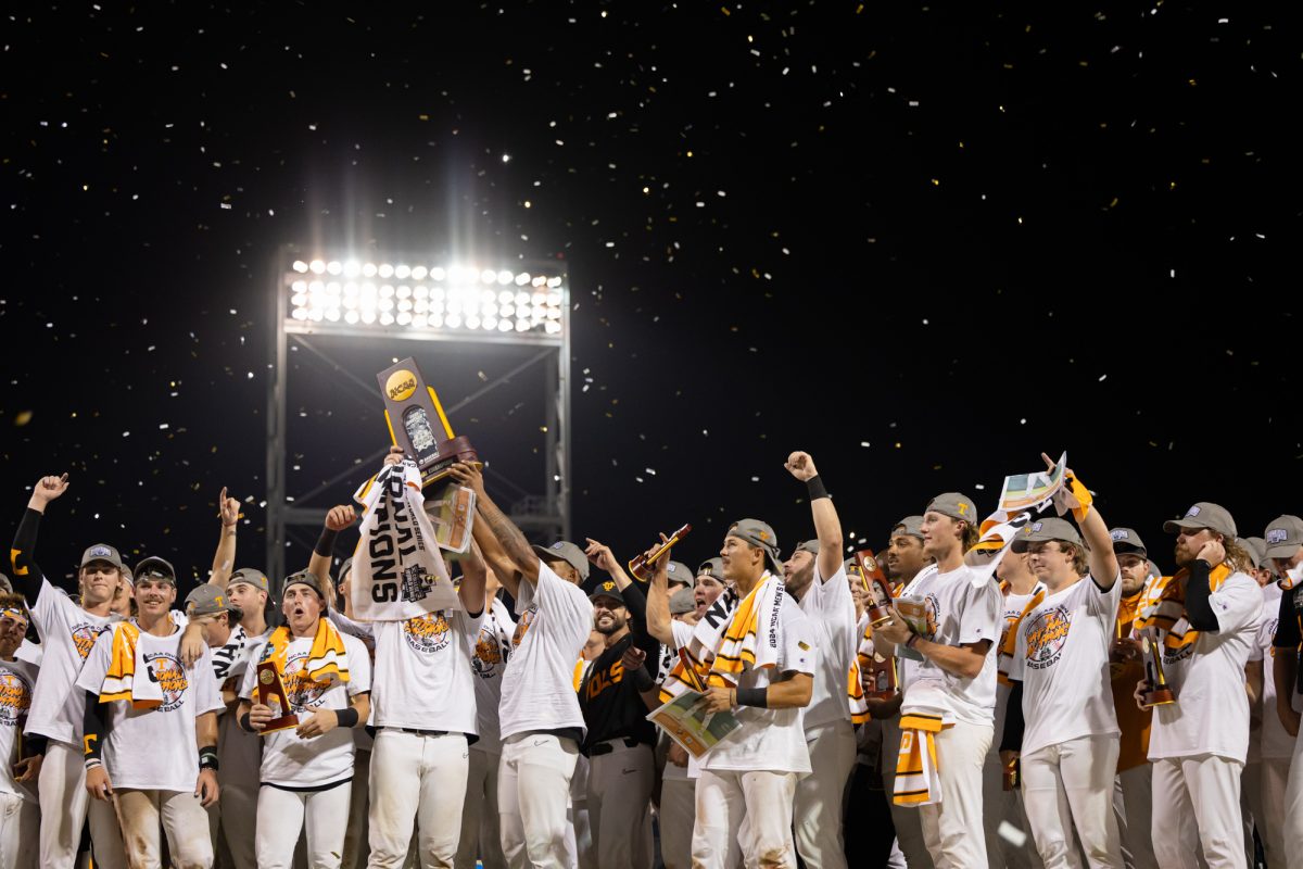 The Volunteers raise the National Championship trophy after Tennessee’s win against Texas A&M at the NCAA Men’s College World Series finals at Charles Schwab Field in Omaha, Nebraska on Monday, June 24, 2024. (Chris Swann/The Battalion)